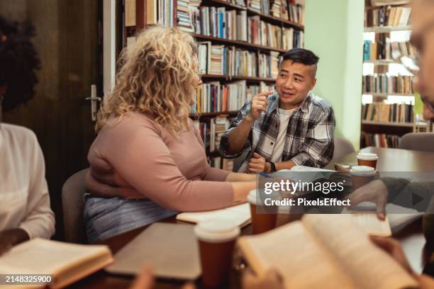Talking In The Library 32,982 Library Talking Stock Photos, High-Res Pictures, and Images ...