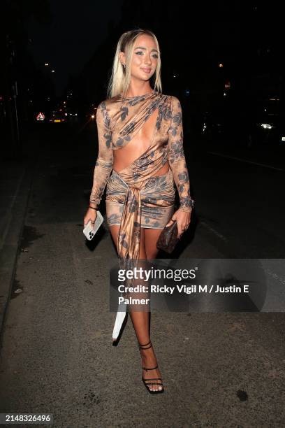 Abi Moores seen attending PrettyLittleThing Showroom 1st Birthday Event on April 11, 2024 in London, England.