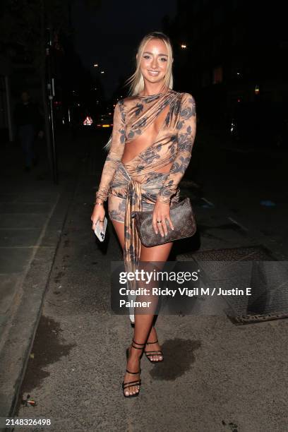 Abi Moores seen attending PrettyLittleThing Showroom 1st Birthday Event on April 11, 2024 in London, England.