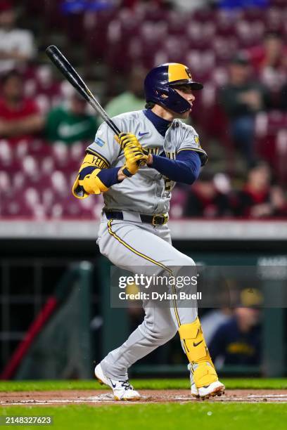 Christian Yelich of the Milwaukee Brewers hits a home run in the first inning against the Cincinnati Reds at Great American Ball Park on April 10,...