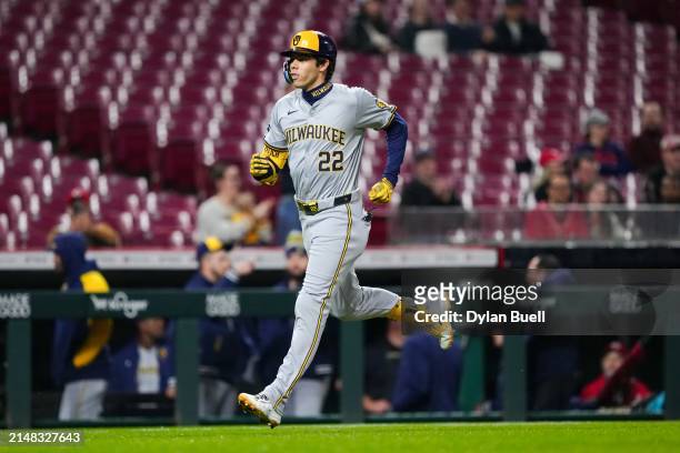 Christian Yelich of the Milwaukee Brewers rounds the bases after hitting a home run in the first inning at Great American Ball Park on April 10, 2024...
