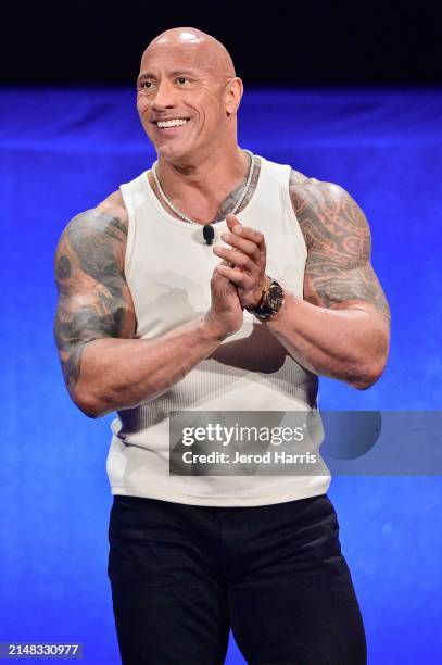 Dwayne Johnson speaks onstage at Walt Disney Studios' 2024 presentation highlighting its upcoming release schedule at The Colosseum at Caesars Palace...