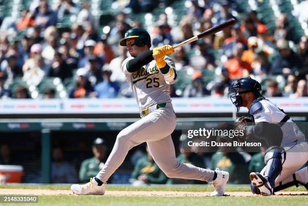 Brent Rooker of the Oakland Athletics bats with catcher Carson Kelly of the Detroit Tigers behind the plate during the first inning at Comerica Park...