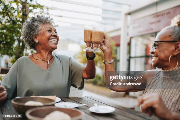 two senior friends at the coffee - self sufficiency stock pictures, royalty-free photos & images