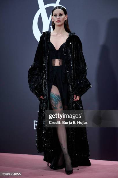 Milena Smit attends to photocall of YSL Loveshine presentation on April 11, 2024 in Madrid, Spain.