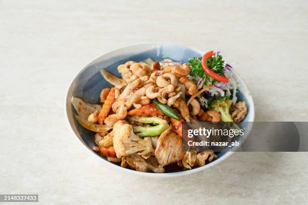 thai cashew nut chicken. - cashew pieces stock pictures, royalty-free photos & images