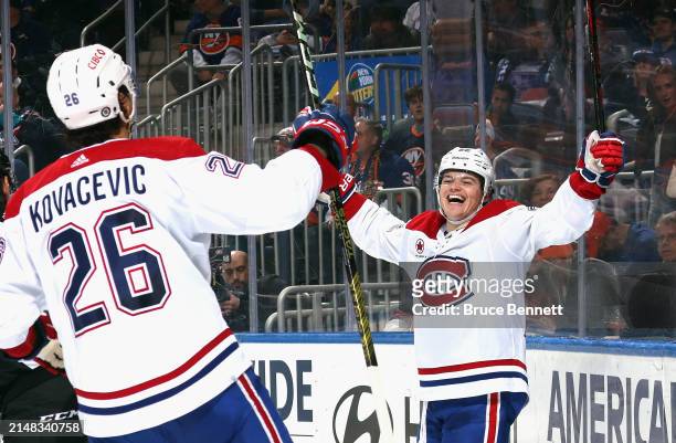 Cole Caufield of the Montreal Canadiens celebrates his third period goal against the New York Islanders at UBS Arena on April 11, 2024 in Elmont, New...