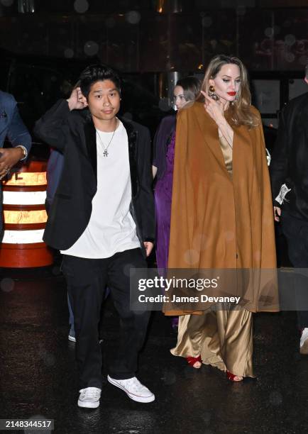 Pax Jolie-Pitt and Angelina Jolie arrive to Cipriani 42nd Street on April 11, 2024 in New York City.