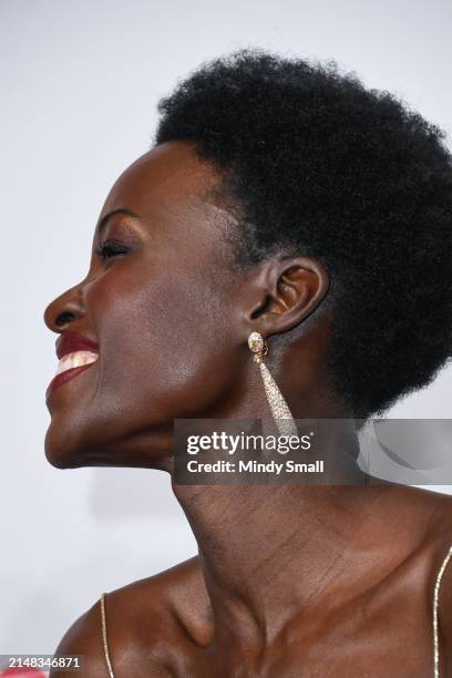 Lupita Nyong'o , earring detail, recipient of the Star of the Year award, attends the CinemaCon Big Screen Achievement Awards at Omnia Nightclub at...
