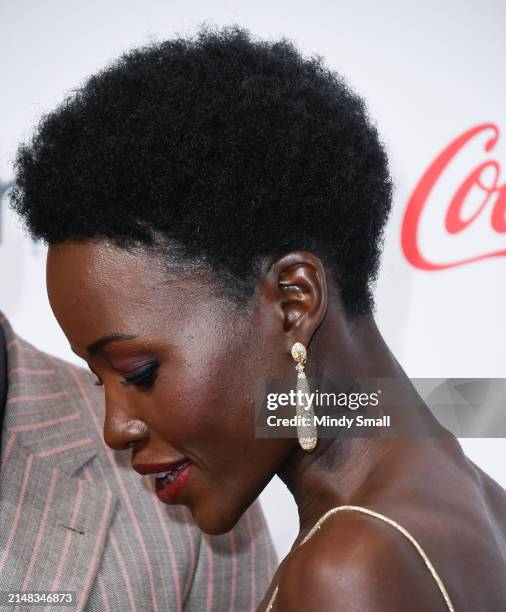 Lupita Nyong'o , earring detail, recipient of the Star of the Year award, attends the CinemaCon Big Screen Achievement Awards at Omnia Nightclub at...