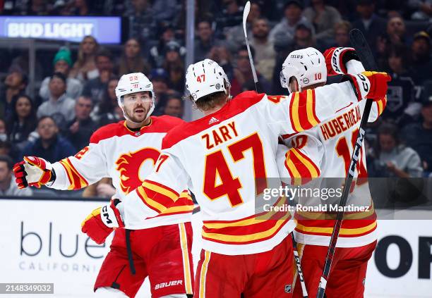 The Calgary Flames celebrate a goal against the Los Angeles Kings in the third period at Crypto.com Arena on April 11, 2024 in Los Angeles,...