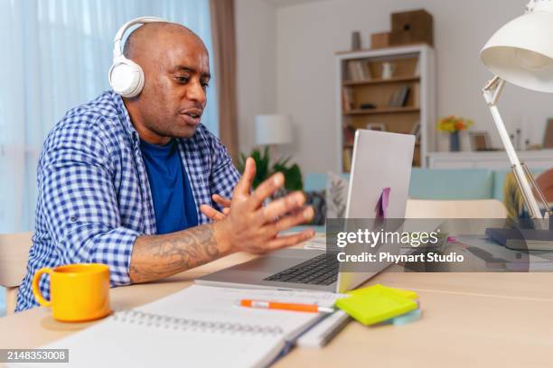 headshot portrait of smiling man looking at camera, video call - camera operator stock pictures, royalty-free photos & images