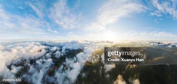the windmill on the mountaintop at sunset - top of mountain pov stock pictures, royalty-free photos & images