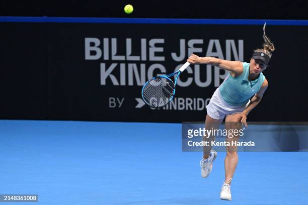 Yulia Putintseva of Kazakhstan serves against Naomi Osaka of Japan during their singles match on day one of Billie Jean King Cup Qualifier between...