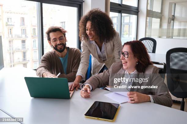 woman in wheelchair in a meeting with diverse group of colleagues - strategy execution stock pictures, royalty-free photos & images