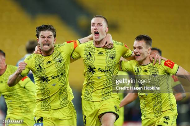 Finn Surman of the Phoenix celebrates with Alex Rufer and Ben Old after scoring a goal during the A-League Men round 24 match between Wellington...