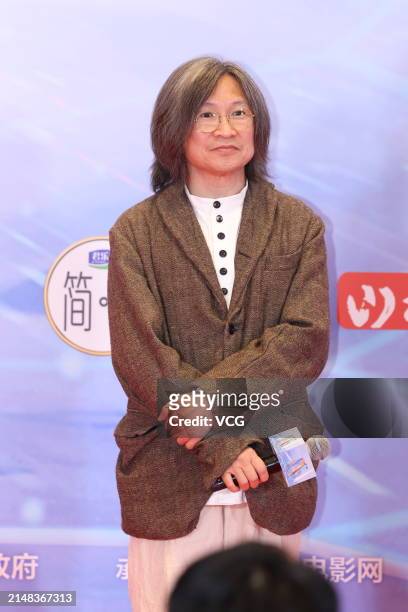 Director Peter Ho-sun Chan arrives at the red carpet for the Ceremony of Chinese Movie Data on April 12, 2024 in Jingzhou, Hubei Province of China.