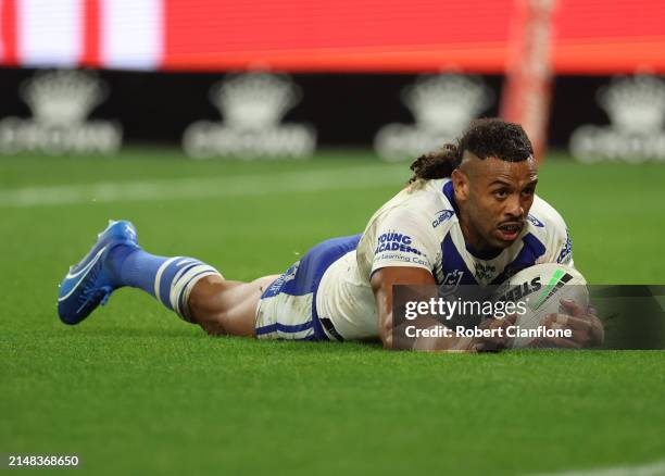 Josh Addo-Carr of the Bulldogs scores a try during the round six NRL match between Melbourne Storm and Canterbury Bulldogs at AAMI Park, on April 12...