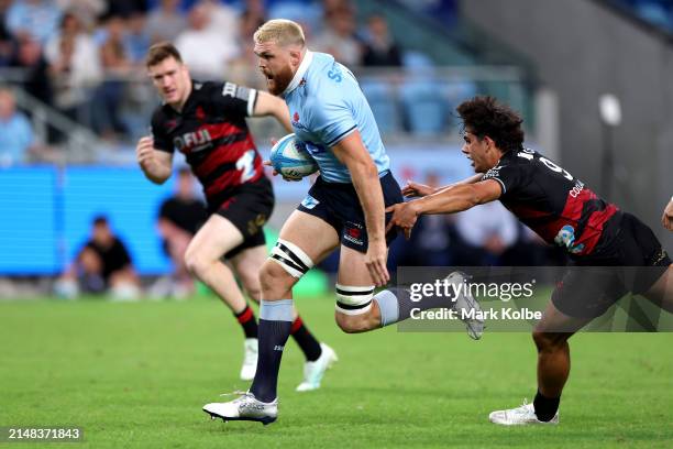 Lachlan Swinton of the NSW Waratahs heads across for a try during the round eight Super Rugby Pacific match between NSW Waratahs and Crusaders at...