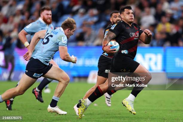Levi Aumua of the Crusaders breaks away during the round eight Super Rugby Pacific match between NSW Waratahs and Crusaders at Allianz Stadium, on...