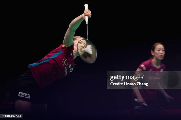 Nami Matsuyama and Chiharu Shida of Japan compete in the Women's Doubles Quarter Finals match against Zheng Yu and Zhang Shuxian of China during day...