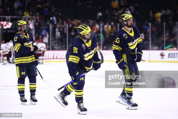 Frank Nazar III of the Michigan Wolverines and teammates react after their 4-0 loss against the Boston College Eagles during the Division I Mens Ice...