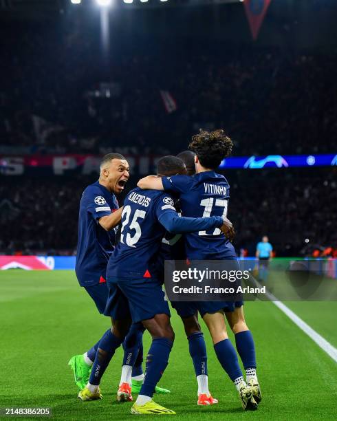 Ousmane Dembele of PSG celebrates with teammates after scoring his team's first goal during the UEFA Champions League quarter-final first leg match...