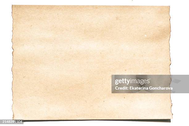 a torn burnt edge of recycled paper on a white background. - manuscrito fotografías e imágenes de stock