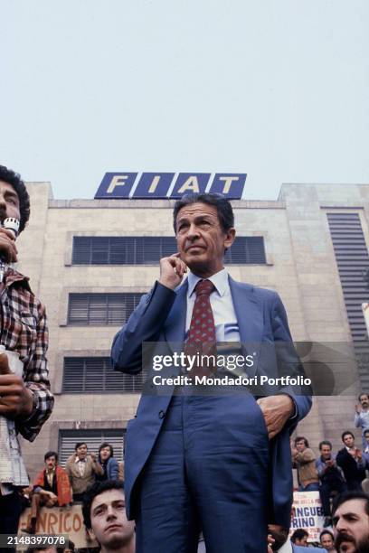 Italian Communist Party Secretary Enrico Berlinguer attends a meeting with striking workers in front of the Fiat plant headquarters in Mirafiorio....