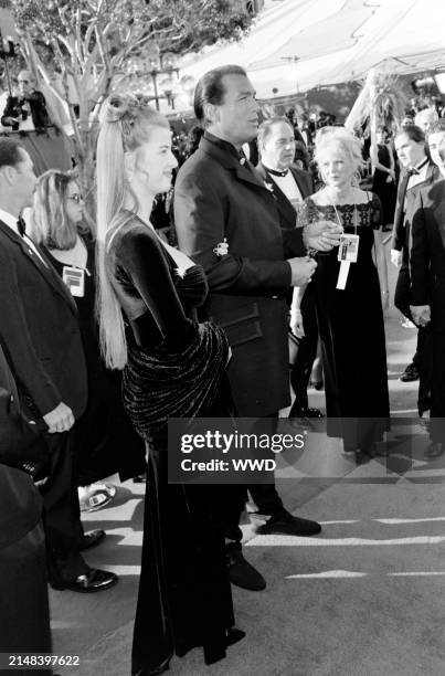 Actor Steven Seagal and Arissa Wolf attend the 68th Annual Academy Awards at the Dorothy Chandler Pavilion in Los Angeles, California on March 25,...