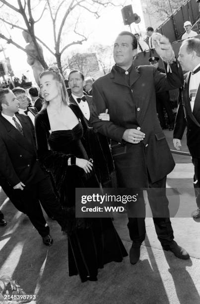 Actor Steven Seagal and Arissa Wolf attend the 68th Annual Academy Awards at the Dorothy Chandler Pavilion in Los Angeles, California on March 25,...