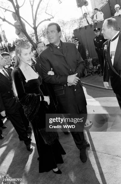 Actor Steven Seagal and Arissa Wolf attend the 68th Annual Academy Awards at the Dorothy Chandler Pavilion in Los Angeles, California on March 25,...