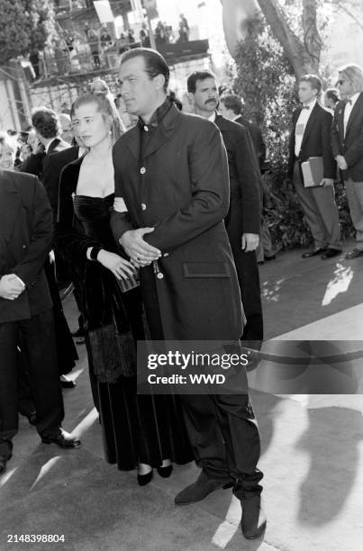 Actor Steven Seagal and Arissa Wolf attend the 68th Annual Academy Awards at the Dorothy Chandler Pavilion in Los Angeles, California on March 25,...