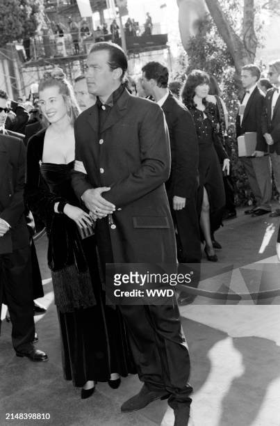 Actor Steven Seagal and Arissa Wolf attend the 68th Annual Academy Awards at the Dorothy Chandler Pavilion in Los Angeles, California on March 25,...