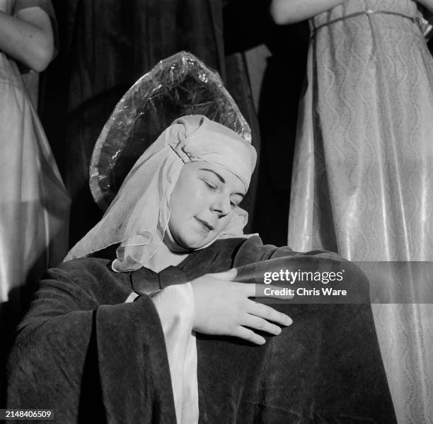 Schoolgirl Christine Statham plays the Virgin Mary in the Nativity at Tottenham High School for Girls in Haringey, London, England, 1948.