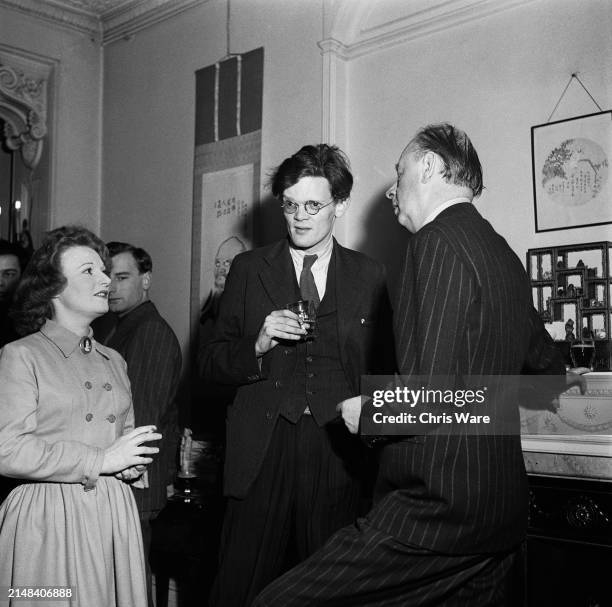 British author, poet and essayist Muriel Spark, British poet and translator John Heath-Stubbs, and British poet and journalist Derek Patmore in...