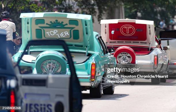 Slab cars make their way through the route of the 36th Annual Houston Art Car Parade on Saturday, April 15, 2023 in Houston.