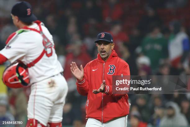 Alex Cora of the Boston Red Sox reacts during the eighth inning against the Baltimore Orioles at Fenway Park on April 11, 2024 in Boston,...