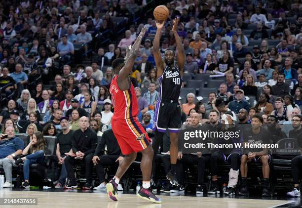 Harrison Barnes of the Sacramento Kings shoots over Zion Williamson of the New Orleans Pelicans during the second half of an NBA basketball game at...