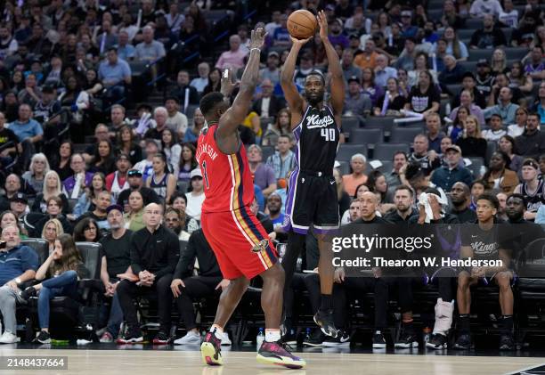 Harrison Barnes of the Sacramento Kings shoots over Zion Williamson of the New Orleans Pelicans during the second half of an NBA basketball game at...