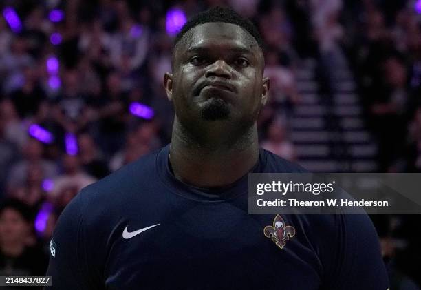 Zion Williamson of the New Orleans Pelicans stands during the singing of the national anthem prior to the start of the game against the Sacramento...