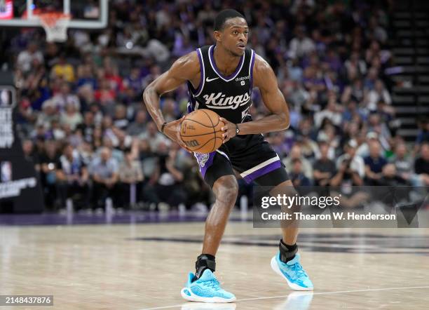 De'Aaron Fox of the Sacramento Kings looks to pass the ball against the New Orleans Pelicans during the second half of an NBA basketball game at...