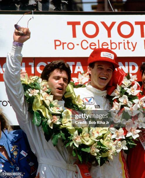 Actor and Racer Lorenzo Lamas is joined by Racer Al Unser Jr during post Pro-Celebrity Race celebrations at the Toyota Long Beach Grand Prix race,...