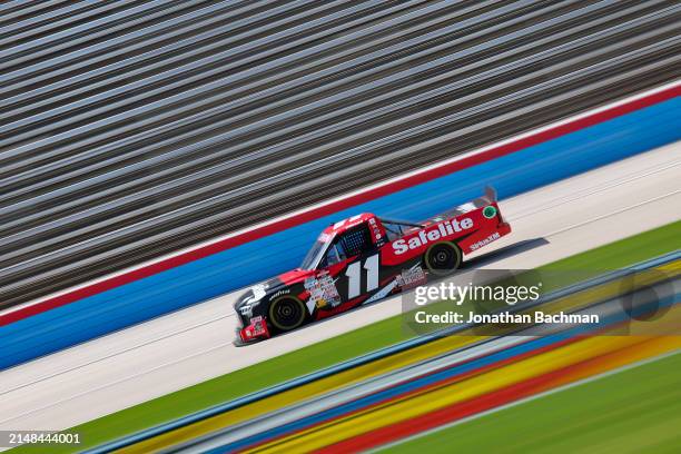 Corey Heim, driver of the Safelite Toyota, drives during practice for the NASCAR Craftsman Truck Series SpeedyCash.com 250 at Texas Motor Speedway on...