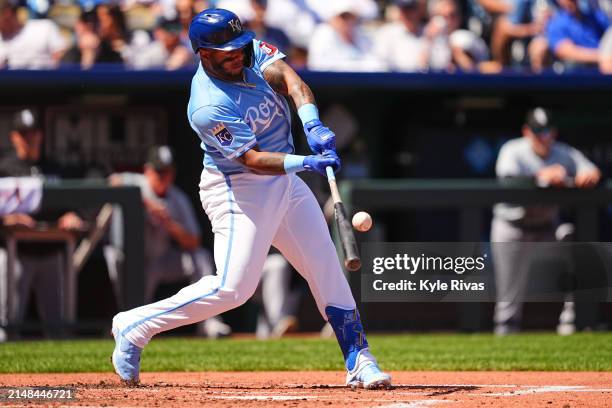 Maikel Garcia of the Kansas City Royals connects with a Chicago White Sox pitch during the second inning at Kauffman Stadium on April 7, 2024 in...