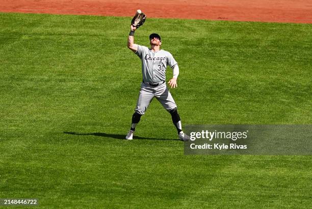 Robbie Grossman of the Chicago White Sox catches a Kansas City Royals outfield hit during the fifth inning at Kauffman Stadium on April 7, 2024 in...