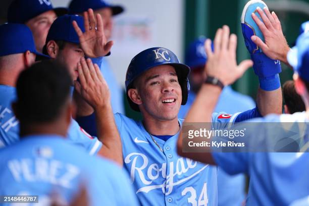 Freddy Fermin of the Kansas City Royals celebrates scoring a run off an error against the Chicago White Sox pitch during the seventh inning at...