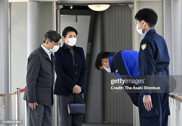 Emperor Naruhito and Empress Masako are welcomed by Ishikawa Prefecture Governor Hiroshi Hase on arrival at Noto Airport on April 12, 2024 in Wajima,...