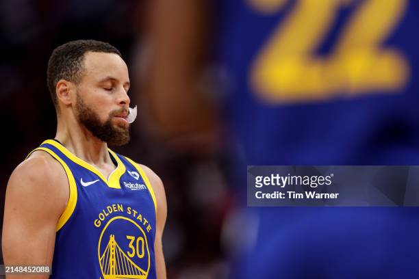 Stephen Curry of the Golden State Warriors prepares to take a free throw in the second half against the Houston Rockets at Toyota Center on April 04,...