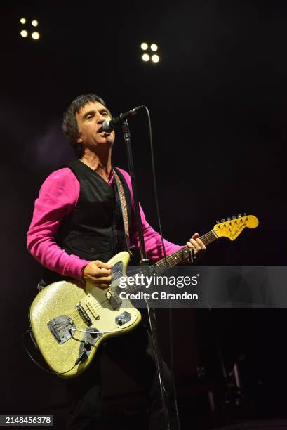 Johnny Marr performs on stage at the Eventim Apollo on April 12, 2024 in London, England.